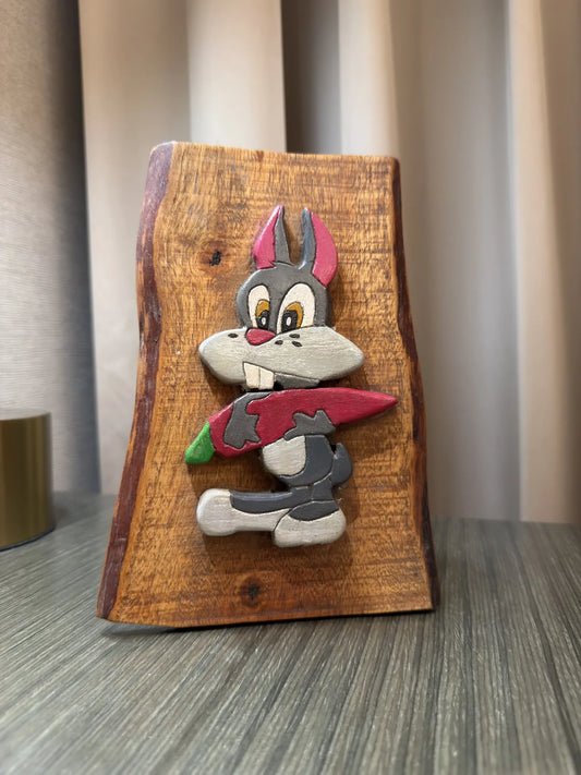 Handcrafted wooden bunny carving by Indian artisan - unique art piece